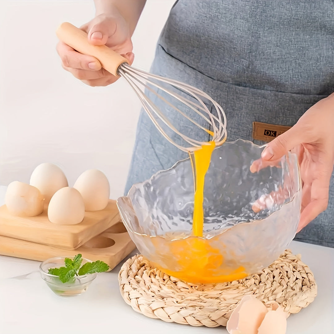 Heat resistant kitchen ladle for serving soups and sauces safely