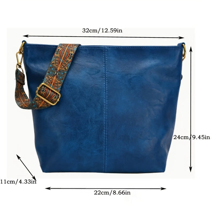 Interior slip pocket detail inside the oversized everyday shoulder bag