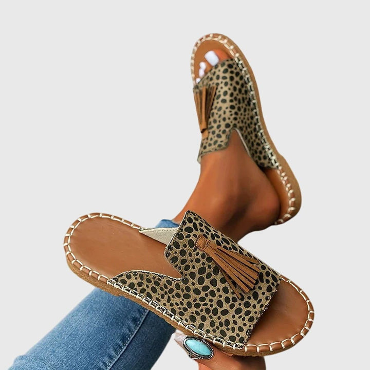 Close-up of supportive arch and contoured footbed on women's summer sandals