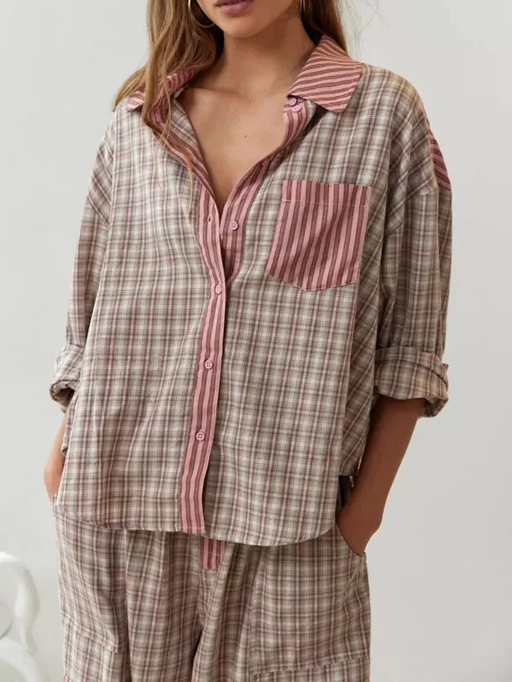 Cozy two piece loungewear set with plaid pattern and buttons for relaxing at home