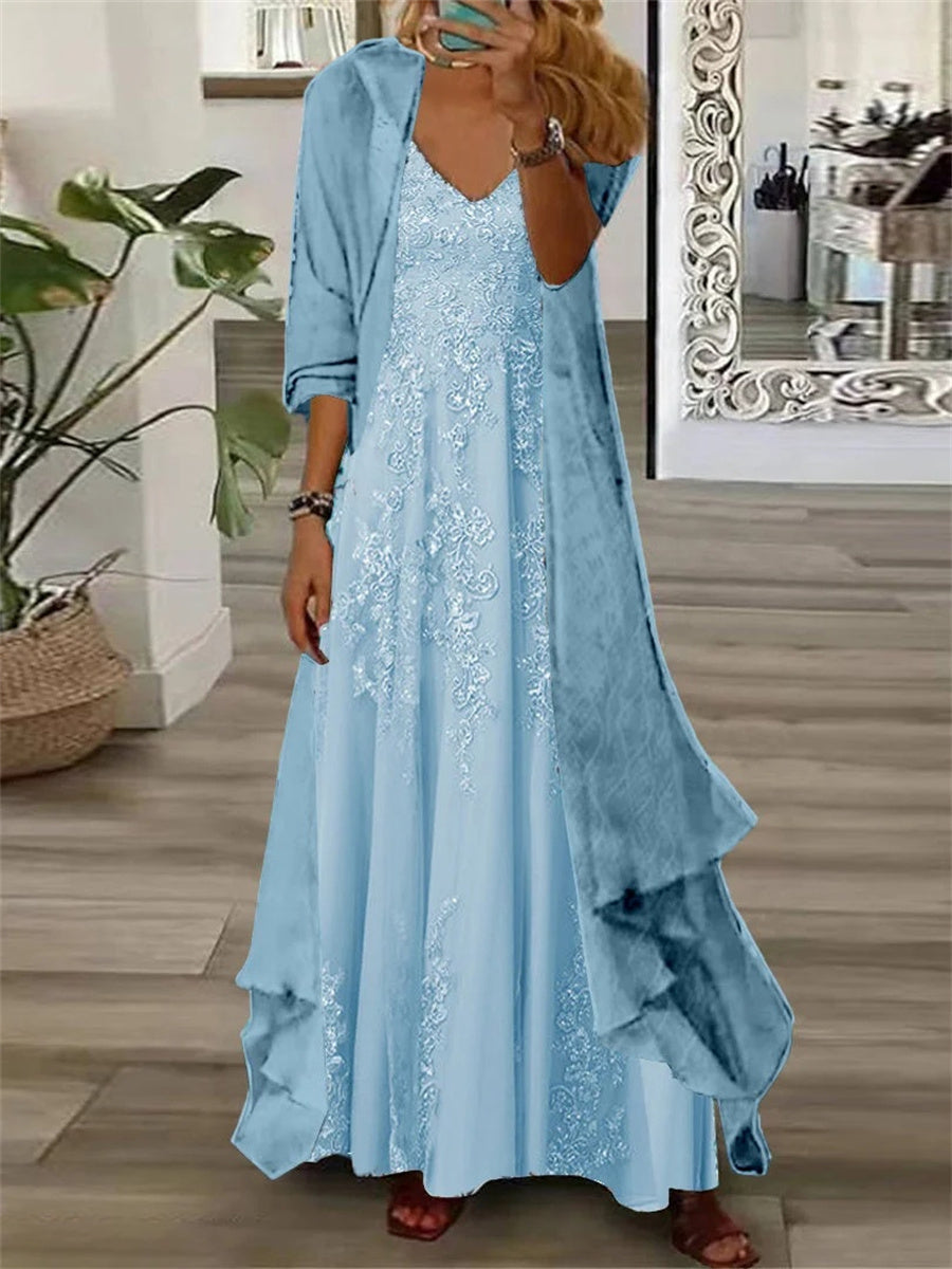 Woman wearing a blue floral V-neck long-sleeve two-piece maxi set