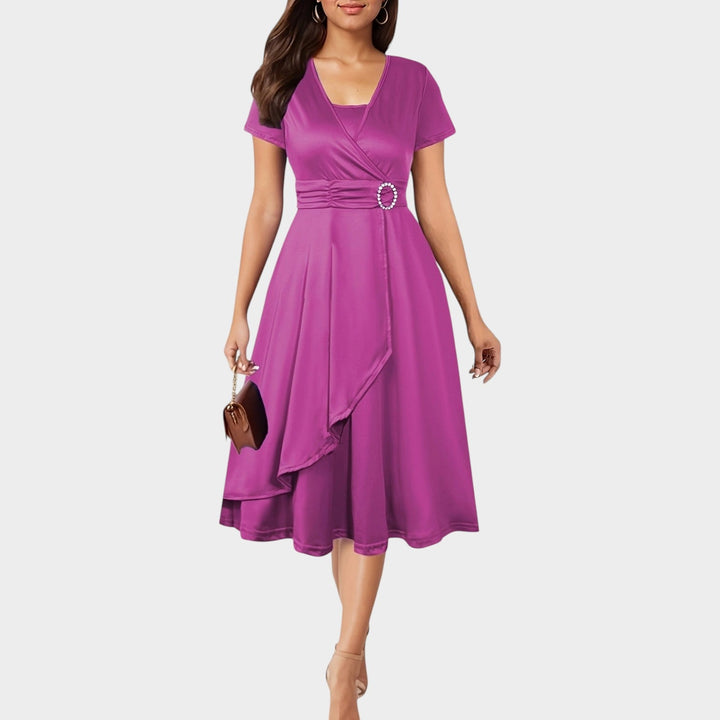 Cocktail dress for women showcasing short sleeves and a crystal embellished waist