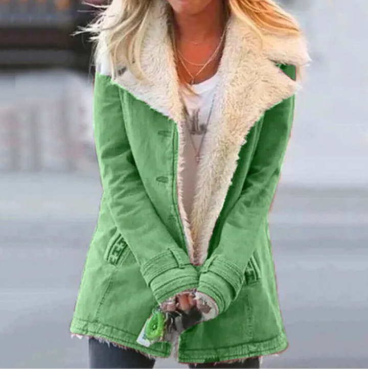 Close-up view of the green thermal winter jacket with plush collar detailing