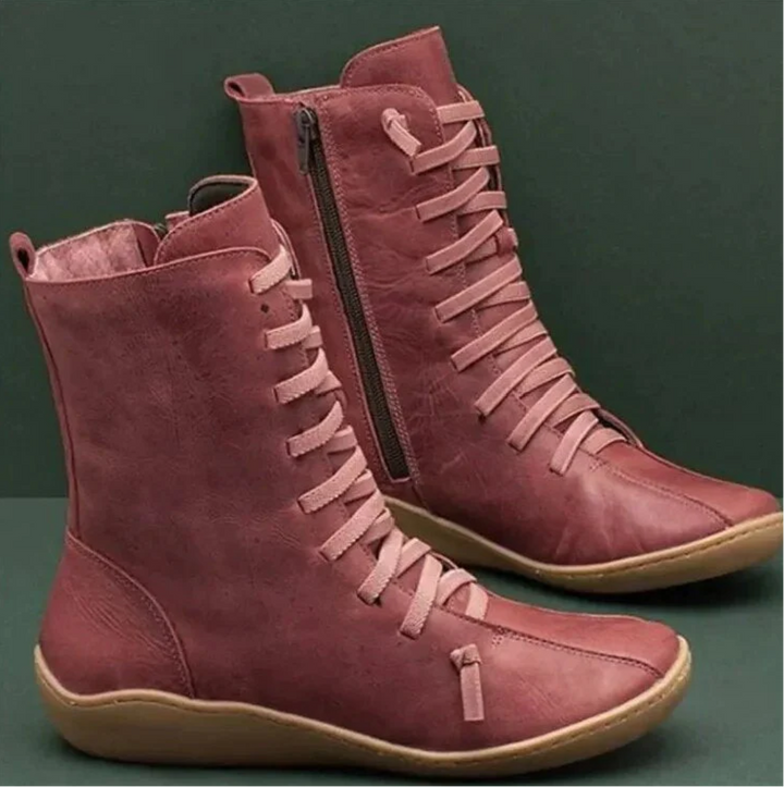 Red women's waterproof winter boots with side zipper and laces