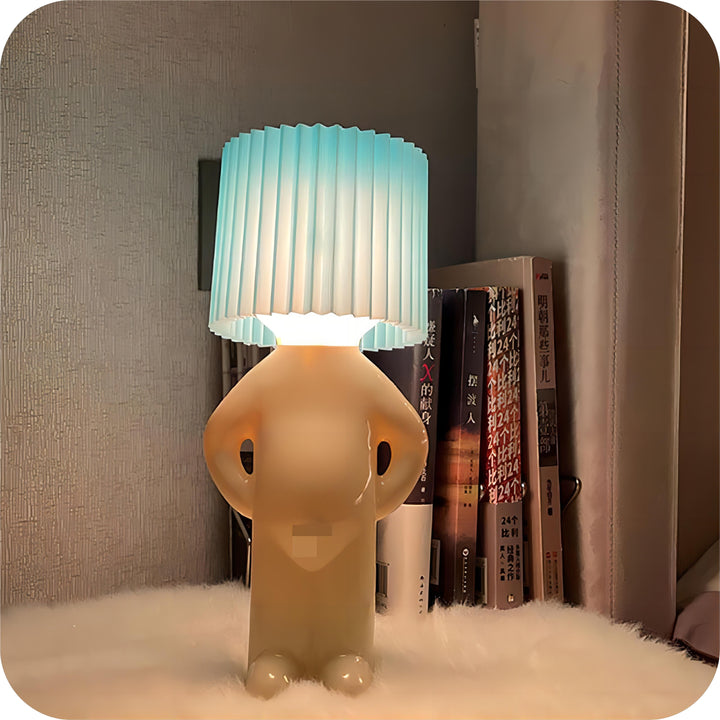 Portable cordless lamp illuminating a cozy reading nook with warm, energy-efficient LED light.
