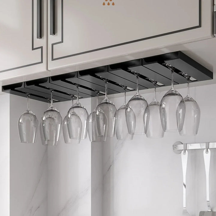 Multiple black wine glass racks holding a collection of stemware
