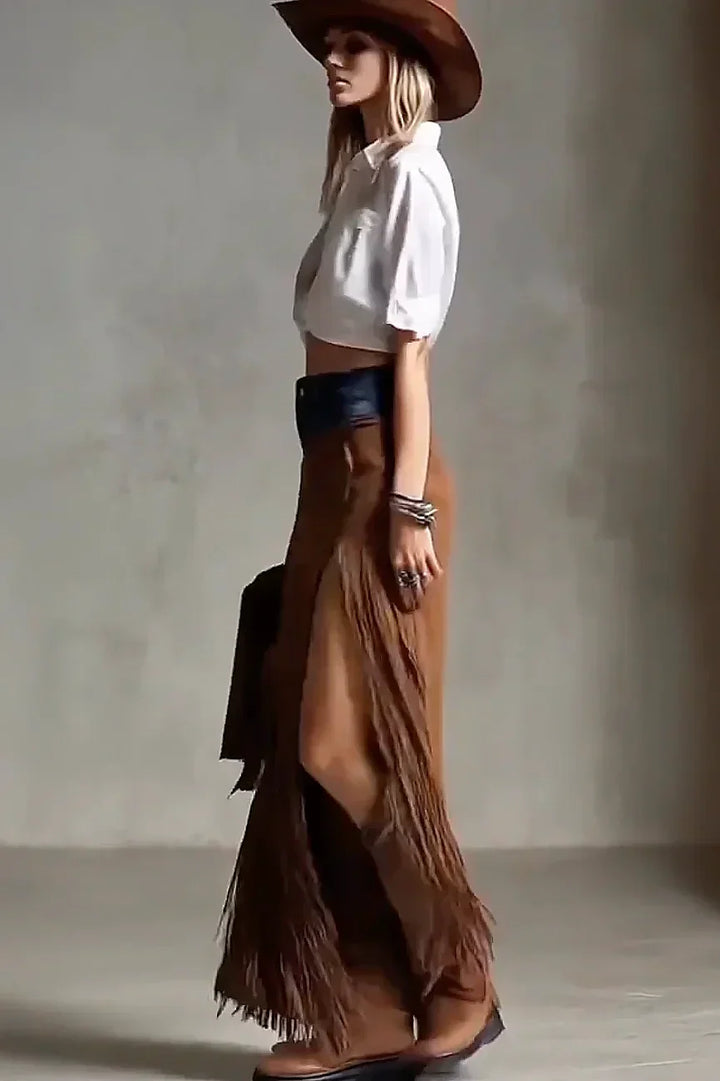 Side profile view of woman modeling the brown fringe maxi skirt