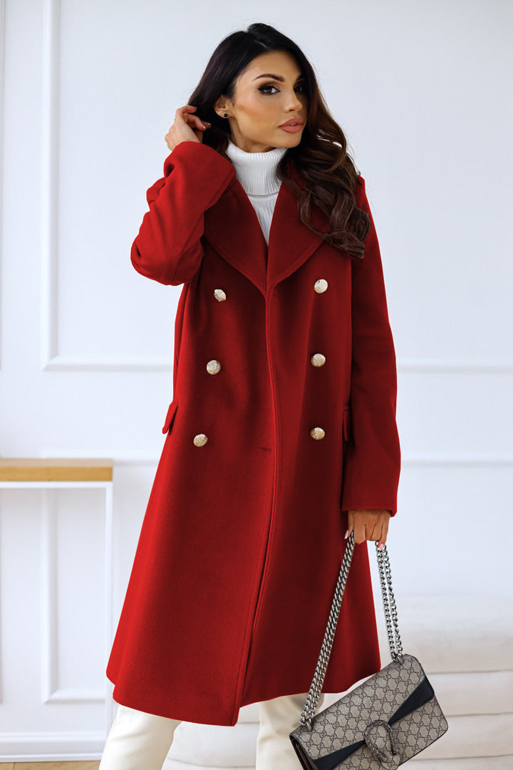 Final look of elegant women's long double-breasted trench coat