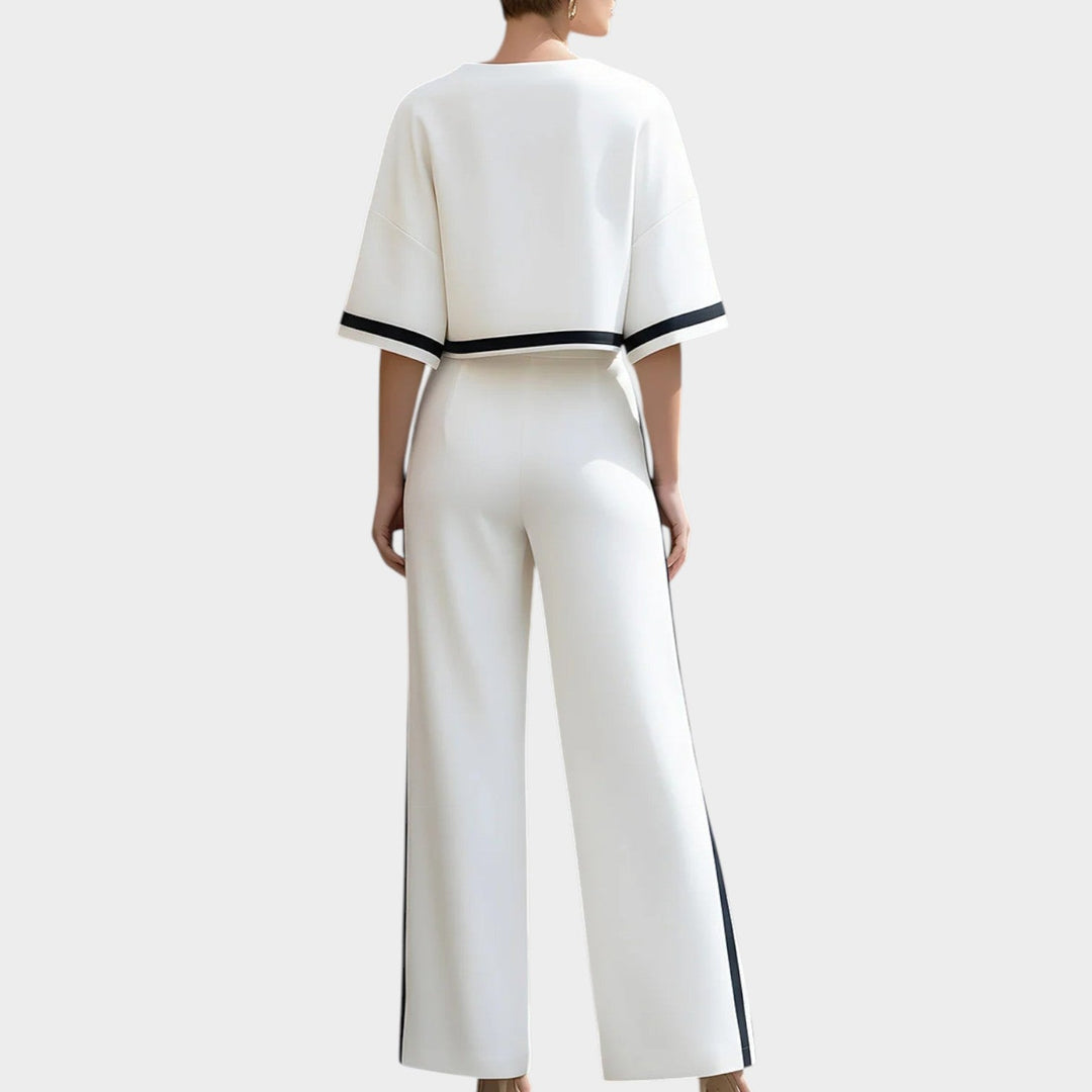 Back view of women's relaxed-fit top and wide-leg trousers set