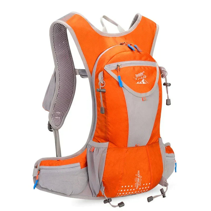 Cyclist riding with lightweight waterproof hydration backpack and 2L bladder