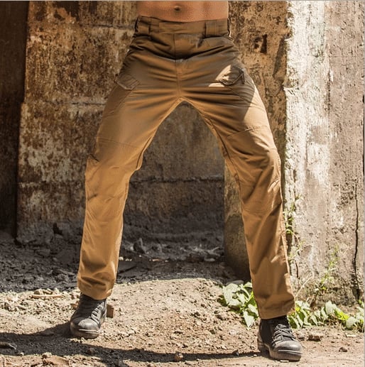 Adjustable waistband detail on waterproof tactical cargo trousers