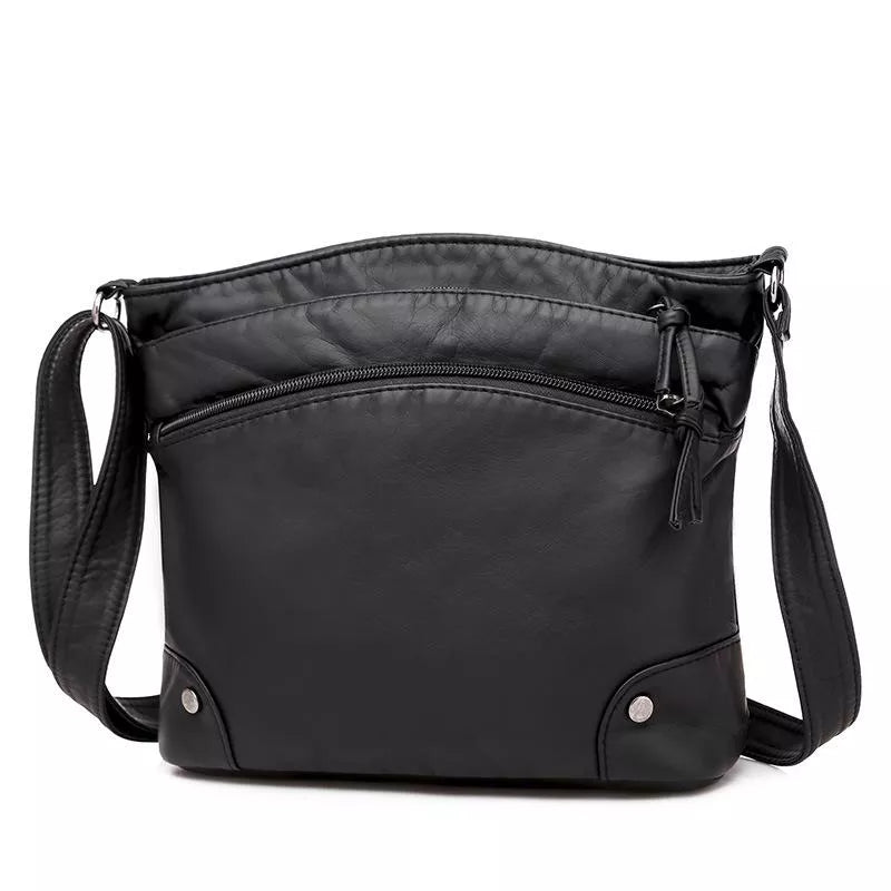Black Zoe shoulder bag shown against a white background