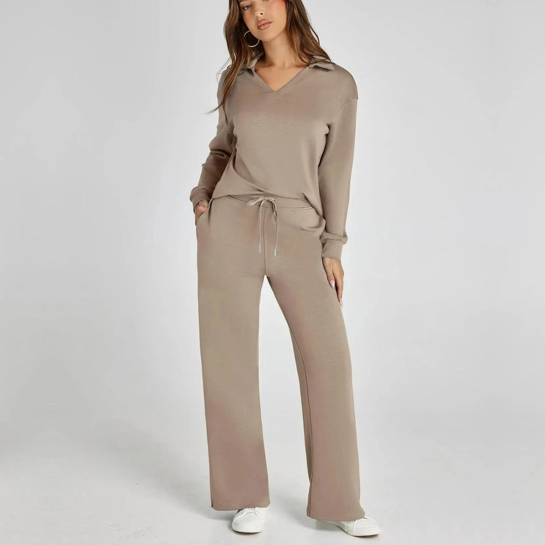 Model wearing brown women's V-neck loungewear set with wide trousers