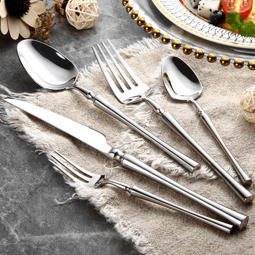 Complete 24-piece dining utensil set featuring ergonomic handles