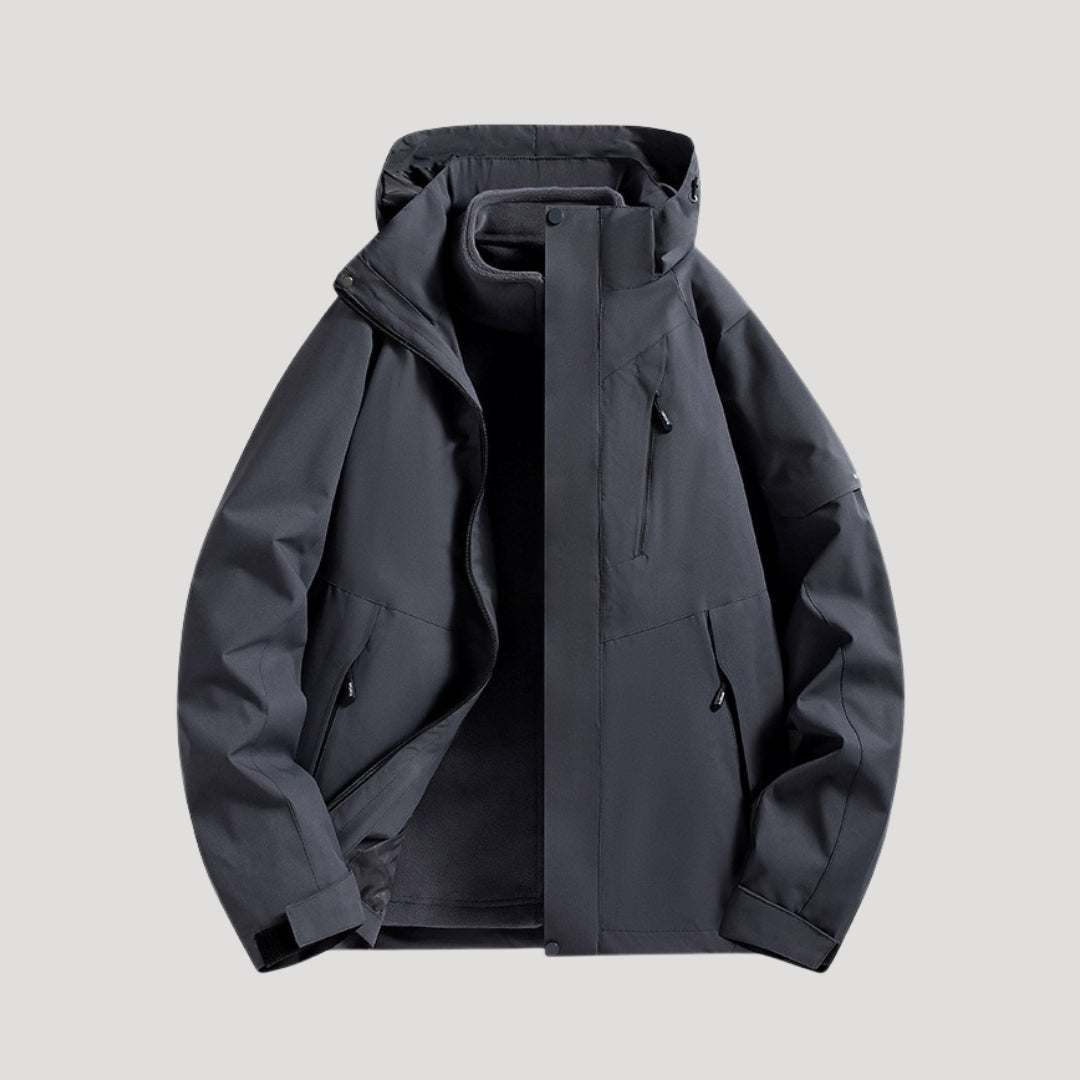 Women's dark grey waterproof hooded outdoor jacket with zipper and pockets