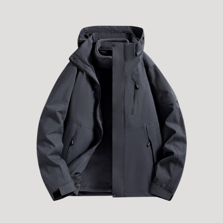 Women's dark grey waterproof hooded outdoor jacket with zipper and pockets