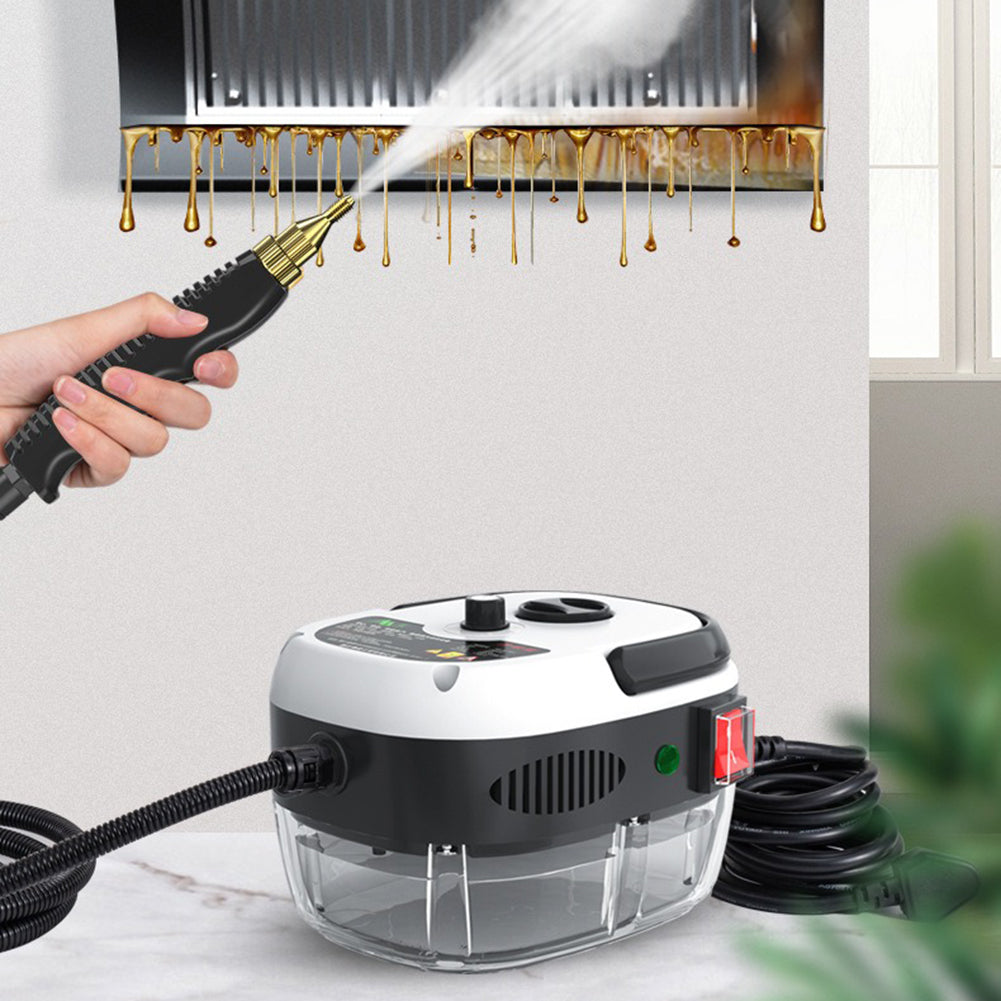 Handheld spray gun of high-pressure steam cleaner cleaning greasy kitchen hood
