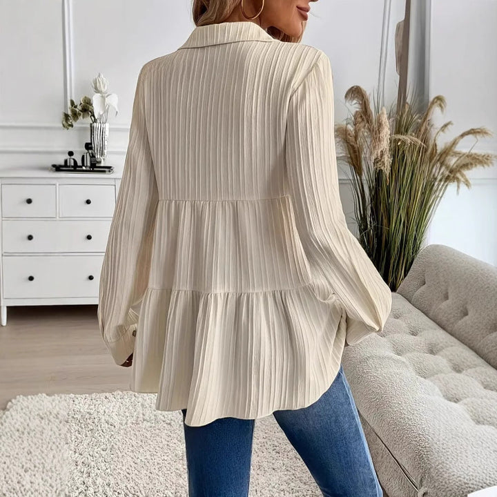Back view of the women's beige shirt showcasing the regular fit