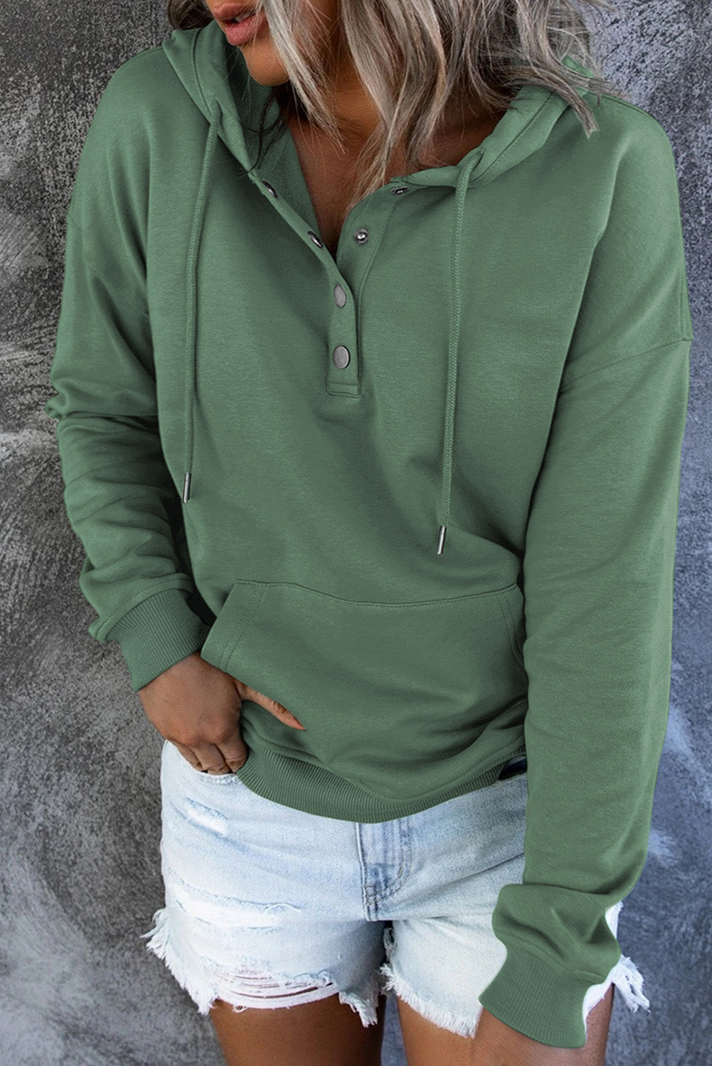 Black women's hoodie styled in an urban streetwear look