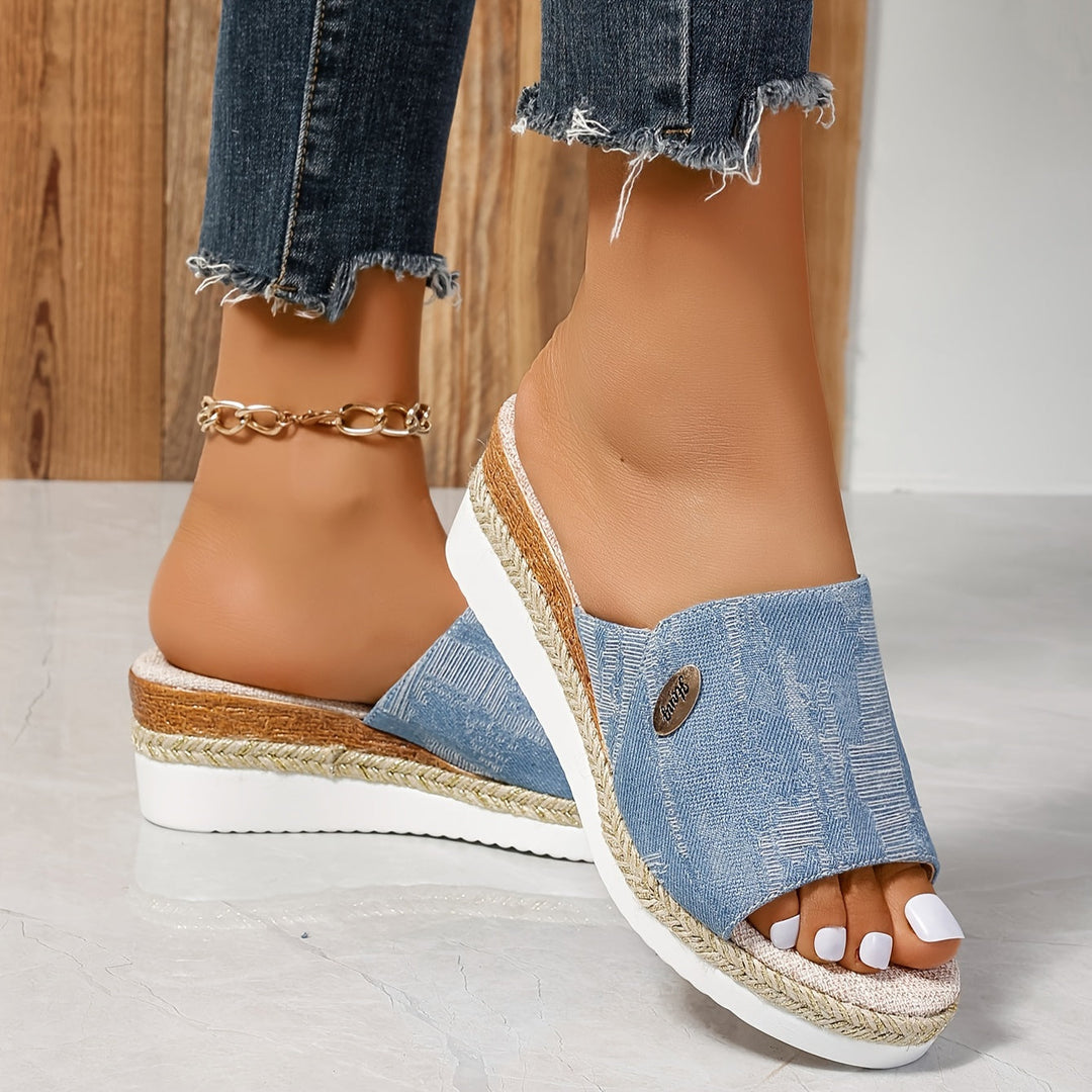 Fashionable casual footwear featuring soft strap and wedge heel