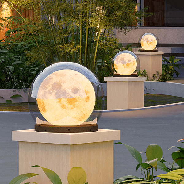 Modern moon-shaped outdoor lamp illuminating a garden path
