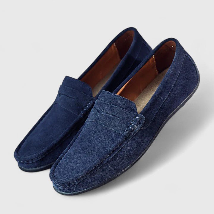 Back heel view of comfortable men's leather loafer with padded collar