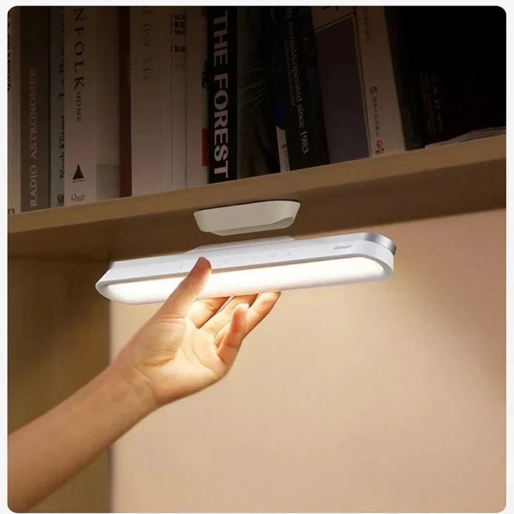 Close-up of touch control panel on rechargeable minimalist office desk lamp