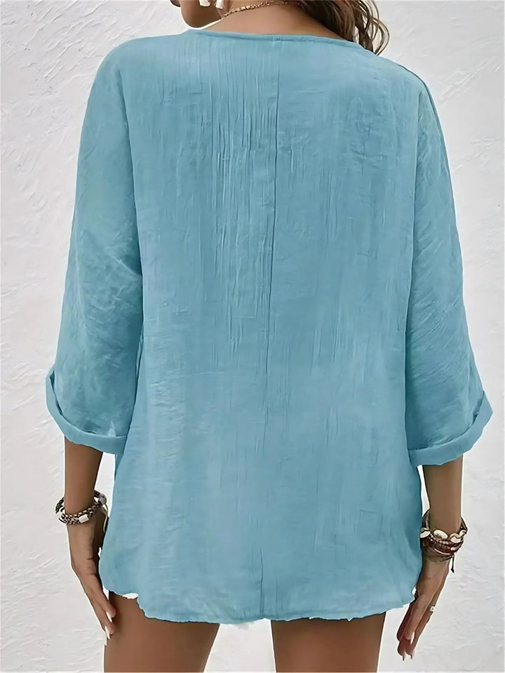 Close-up fabric detail of the breathable womens summer top