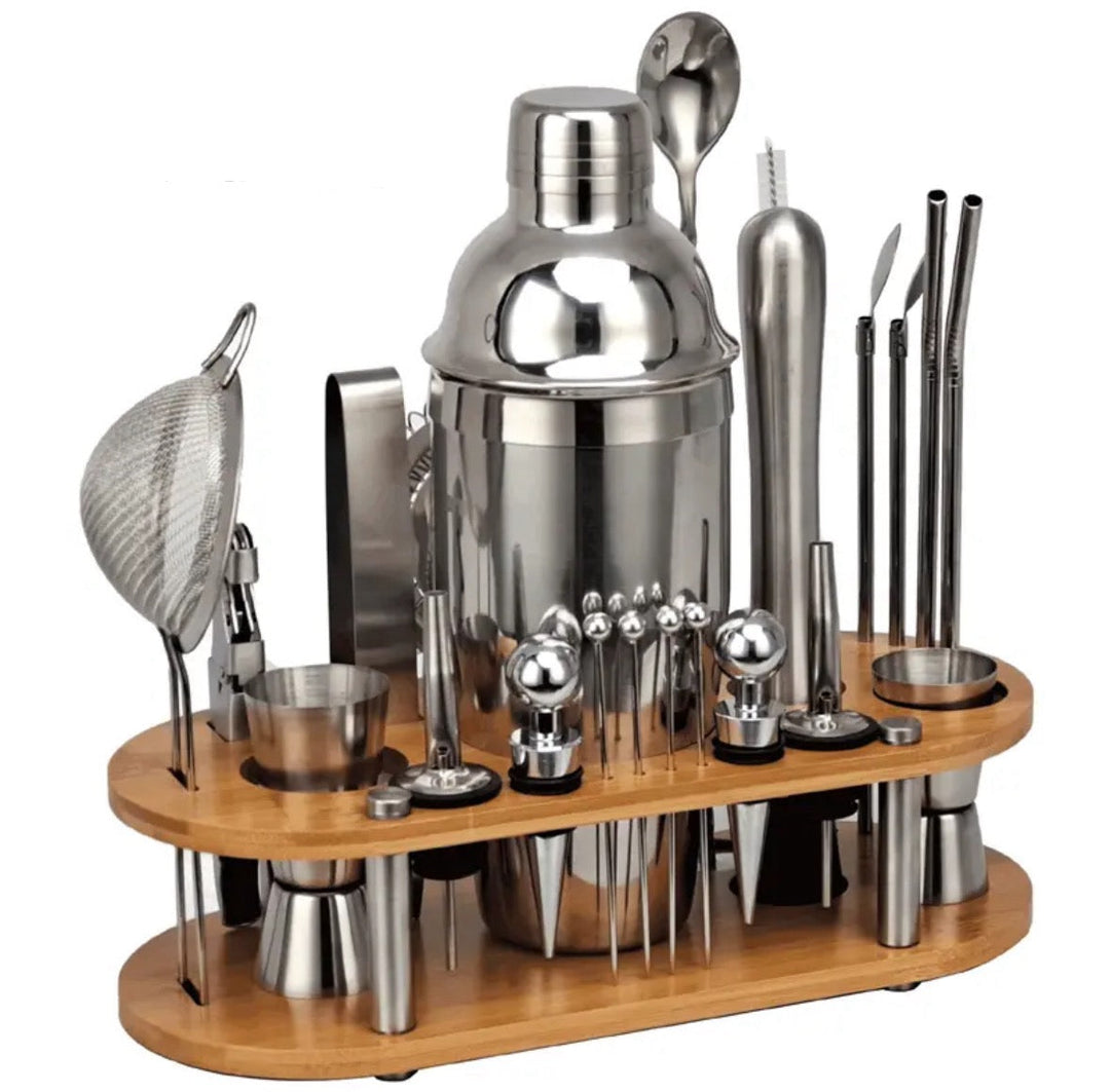 Professional bar tool kit featuring a shaker, strainer, and muddler