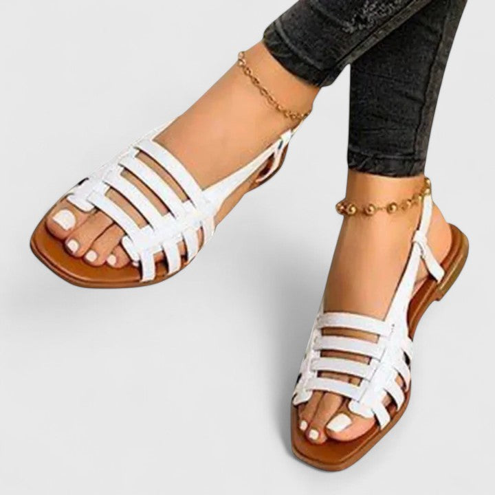 Women wearing white orthopedic slingback sandals for summer wear