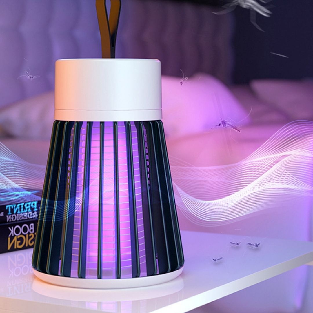 Portable mosquito zapper lamp operating in a bedroom setting