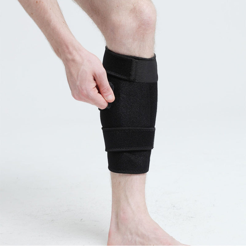 Ergonomic leg support wrap securing the lower leg during workouts