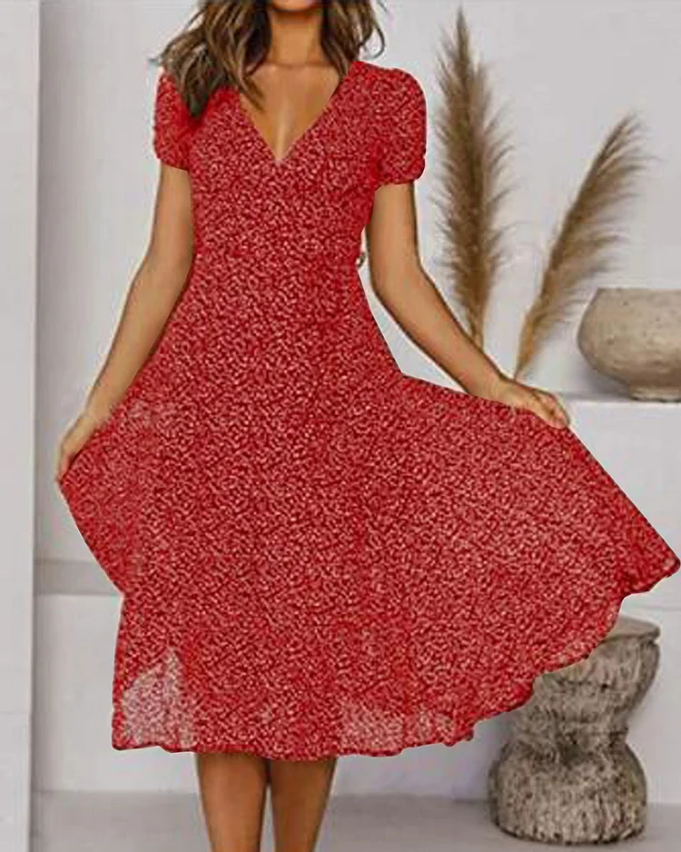 Woman wearing red V-neck puff sleeve midi dress