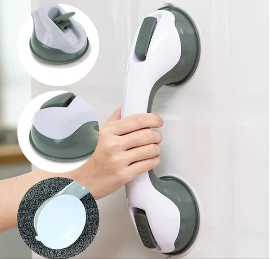 Adhesive support handle showing suction lock mechanism and secure grip