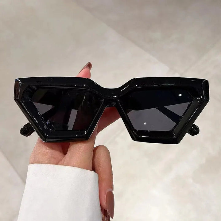 Side view of women's retro square cat-eye sunglasses featuring UV protection.