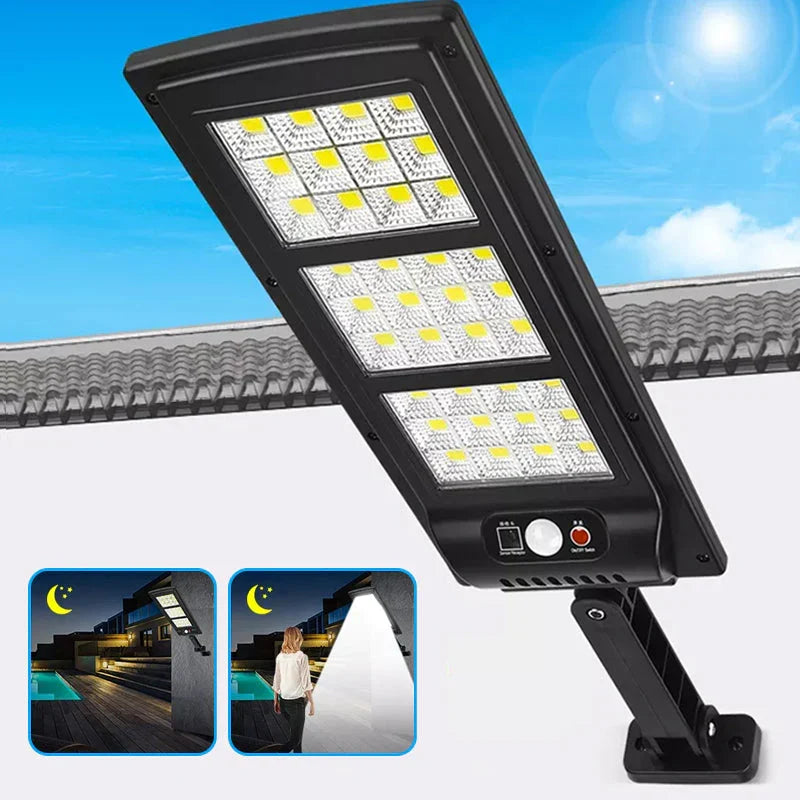 Waterproof solar garden light glowing brightly in the dark during a rainy night outdoors.