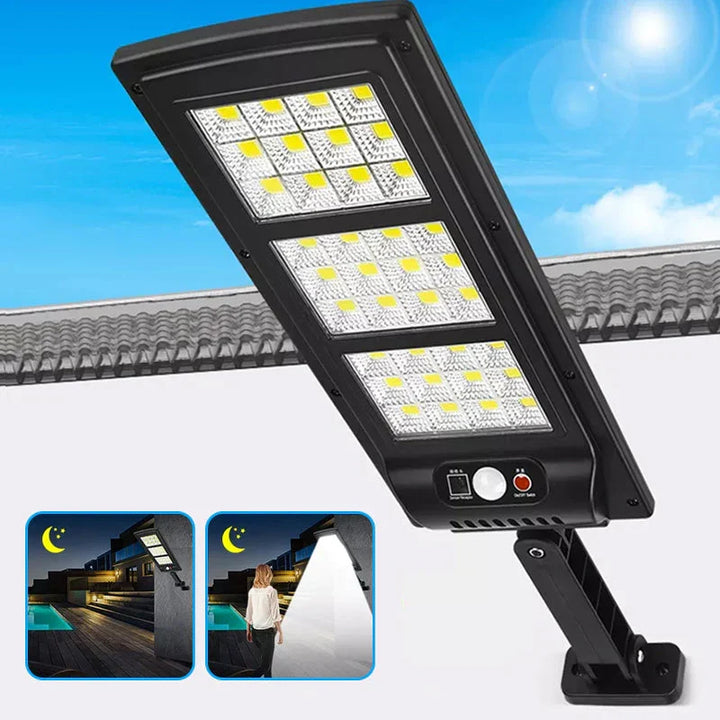 Waterproof solar garden light glowing brightly in the dark during a rainy night outdoors.