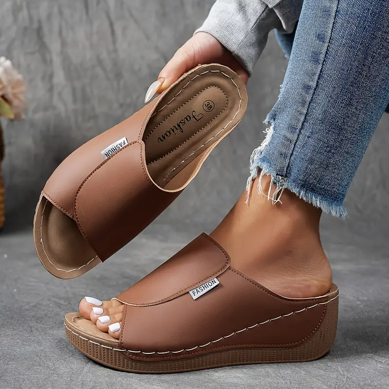 Brown orthopedic arch support wedge sandals shown with visible stitching detail