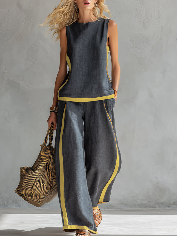 Full view of the women's two-piece wide leg pants set with matching bag and sandals