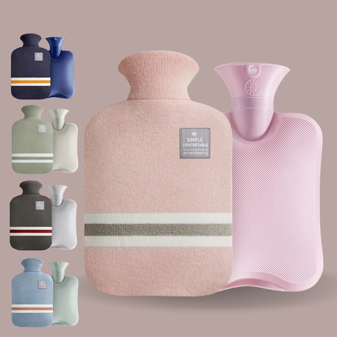 Display of multiple colored hot water bags with matching knit covers in pink, grey, and blue.