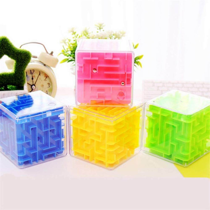 Assorted colored 3D maze puzzle cubes arranged on a tabletop