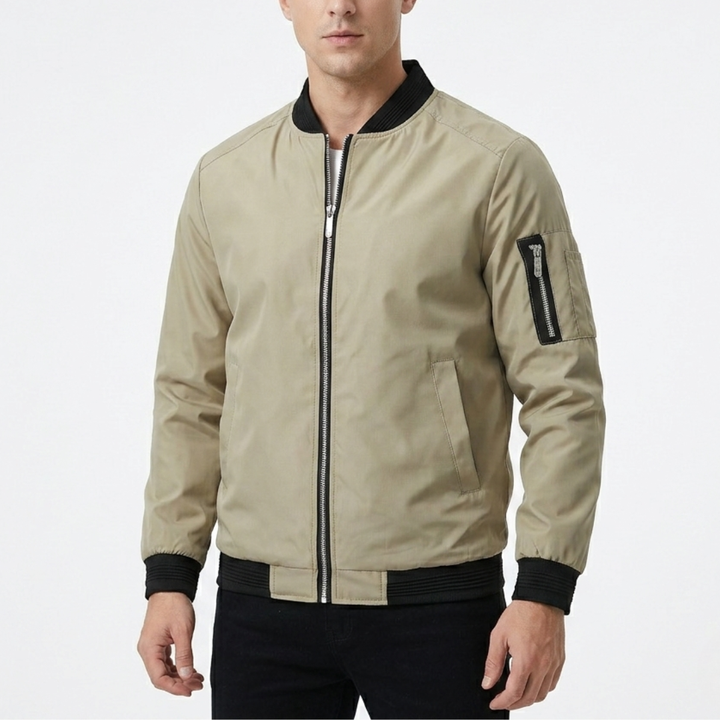 Side profile of men's bomber jacket displaying tailored fit and fabric texture