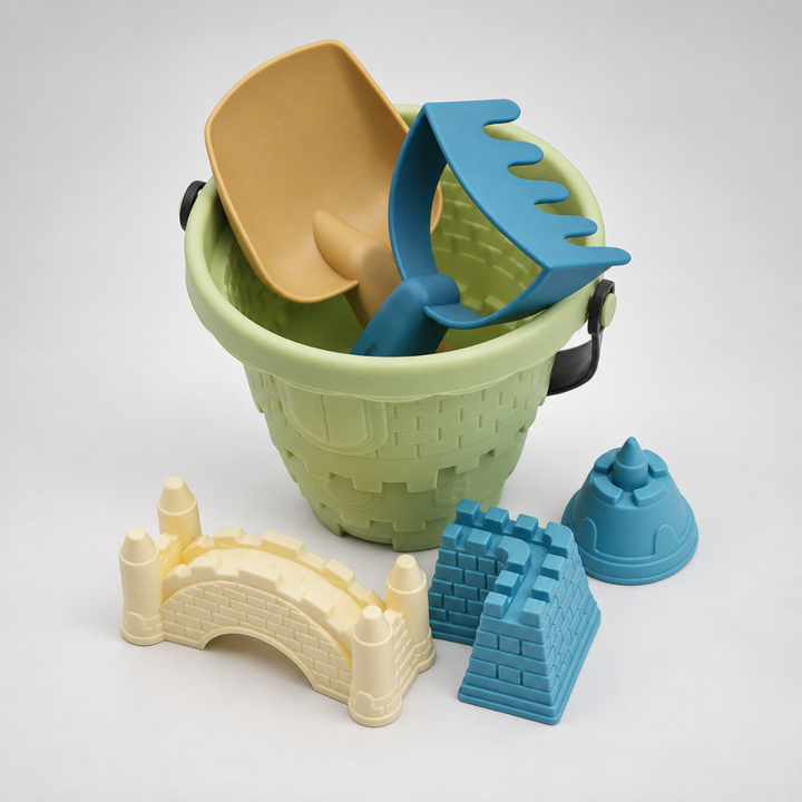 Children's castle sand bucket and beach toy set featuring molds for sandbox fun