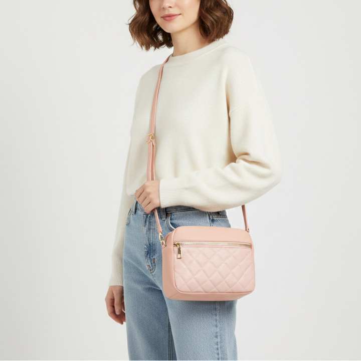 Quilted crossbody bag in black with gold chain strap