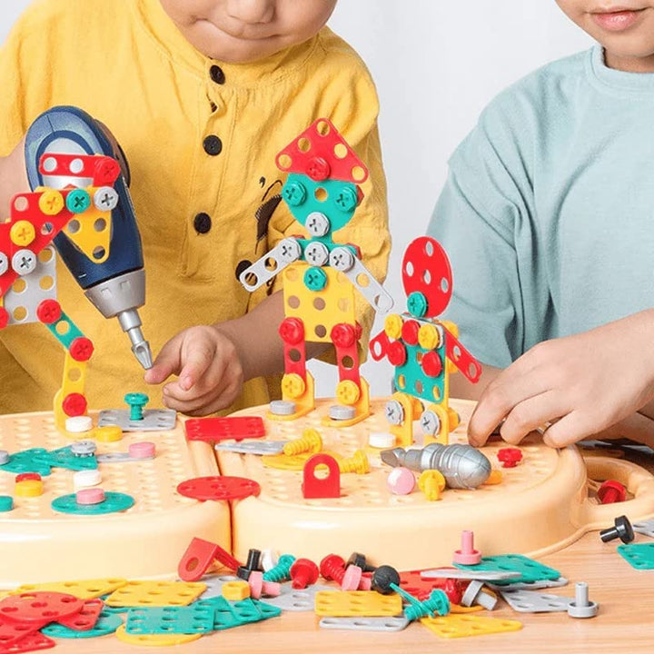 Two children building creations together with colorful puzzle pieces and tools