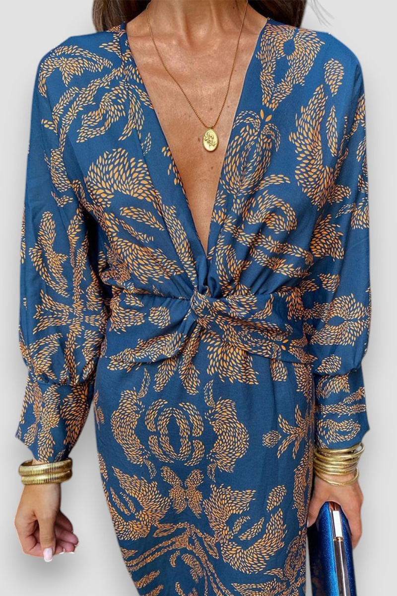 Women's floral midi dress featuring a twist-front V-neck and long sleeves