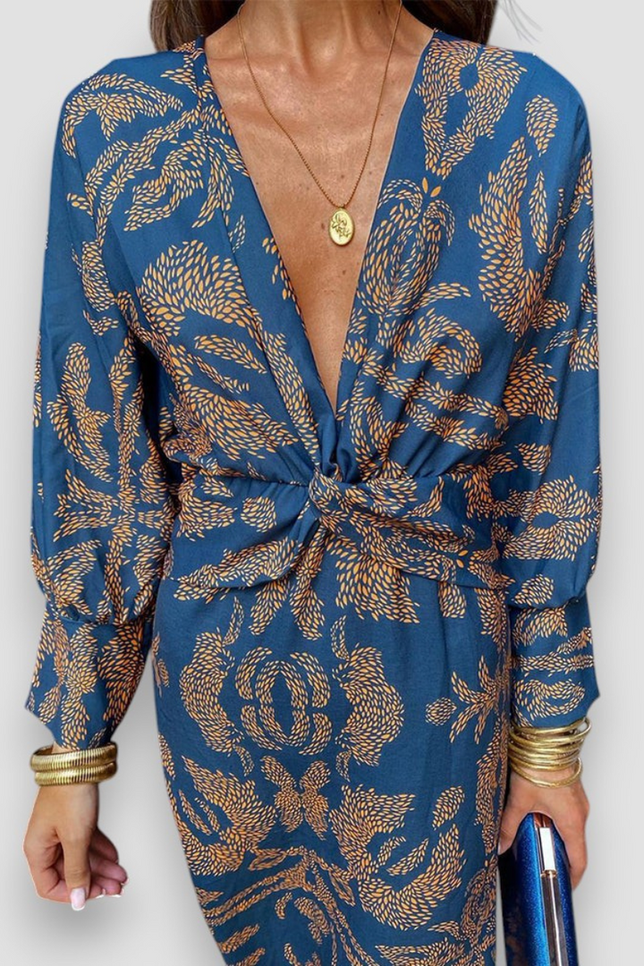 Women's floral midi dress featuring a twist-front V-neck and long sleeves