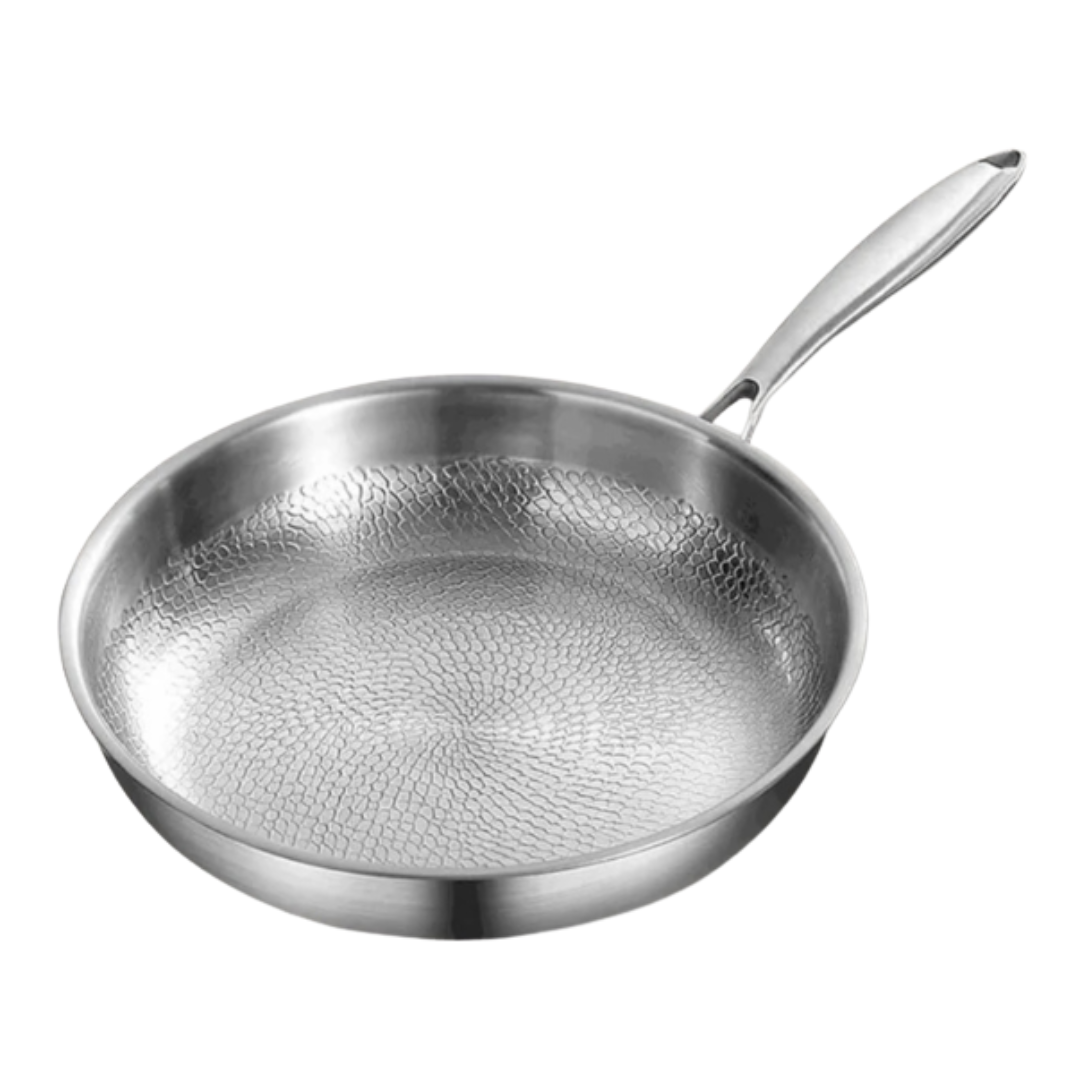 Close-up view of the silver-grey titanium frying pan with hammered interior texture