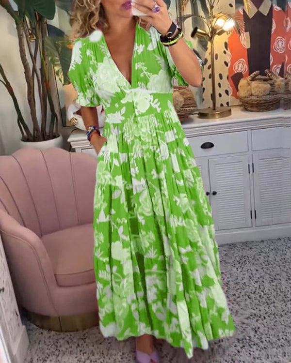 Flat lay of the casual wear floral maxi dress with summer accessories