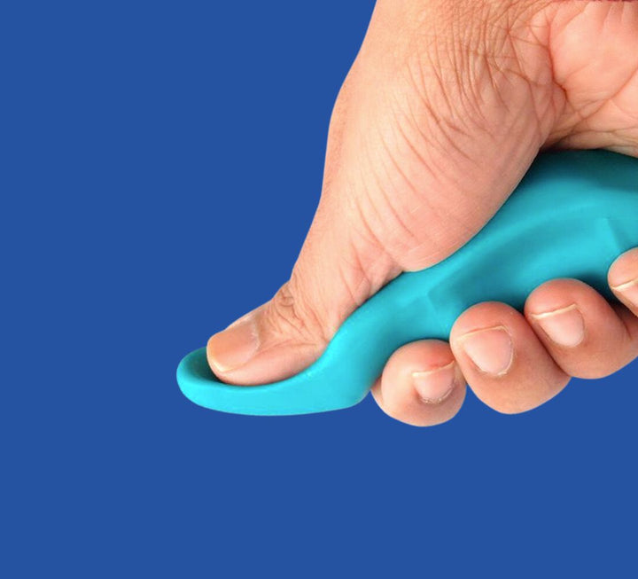 Close-up view of hand holding the ergonomic blue massage tool